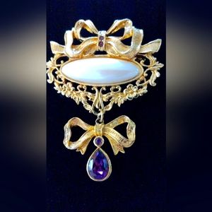 Vintage gold tone brooch with faux amethyst stones, Avon